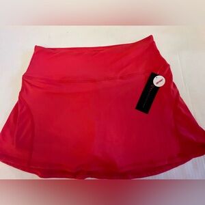 BALLY DRY WIK HIGH WAIST ATHLETIC SKORT. MEDIUM CORAL COLOR. SIZE LARGE. NWT